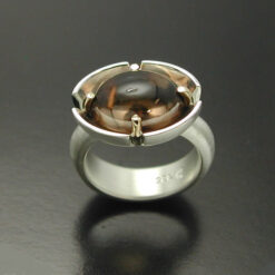 Cabochon Cut Smokey Quartz  Ring in Sterling Silver and 14kt. gold prongs.