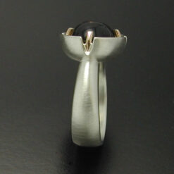 Cabochon Cut Smokey Quartz  Ring in Sterling Silver and 14kt. gold prongs.