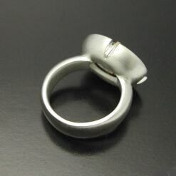 Cabochon Cut Smokey Quartz  Ring in Sterling Silver and 14kt. gold prongs.