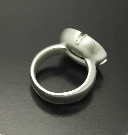 Cabochon Cut Smokey Quartz  Ring in Sterling Silver and 14kt. gold prongs.