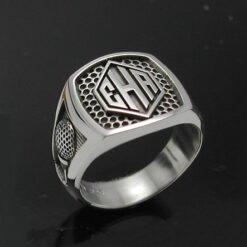 Men's monogrammed golf style ring oxidized.